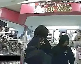 Sitting on a chair panties exposed