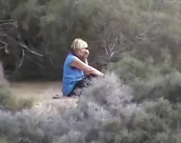 Wife at the beach looking at naked men. Husband films.