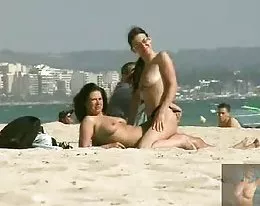 2 friends get naughty on the beach