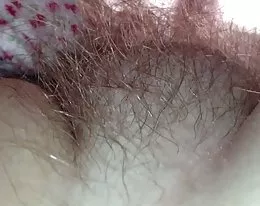 close up of her soft chubby hairy mound.