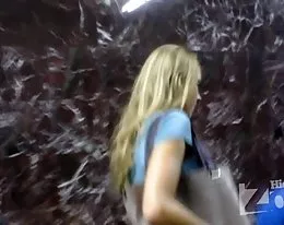 Babe in short blue skirt without panties