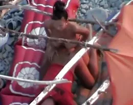 Voyeur on public beach.Wife fuck the hubby with Strapon