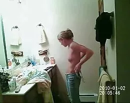 Young girl spied on changing out of bikini