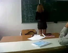 Sexy High School teacher in short skirt voyeur