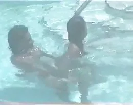 Amateur couple on swimingpool