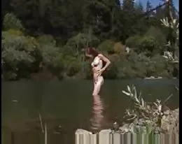 natural redhead getting off by river voyeur style micro mini bikini